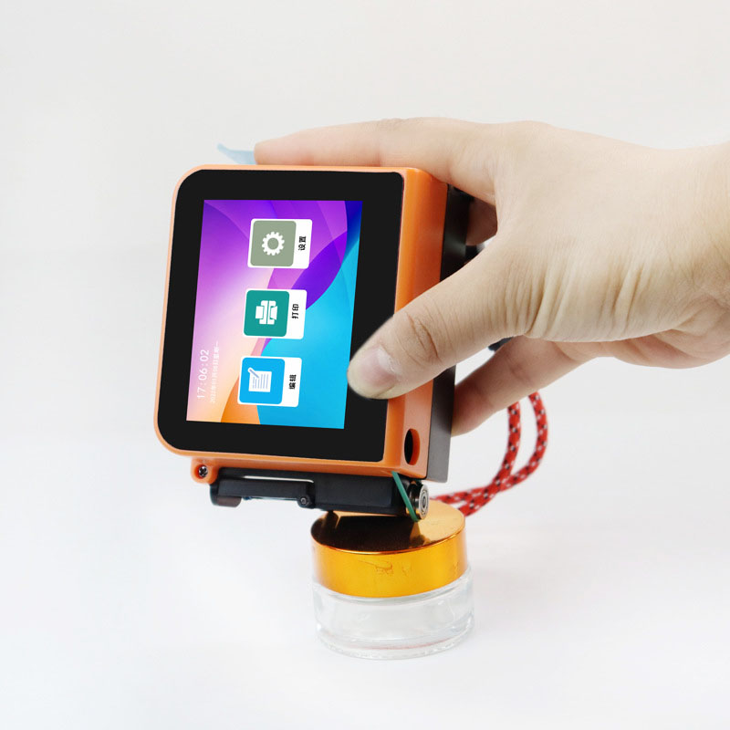 Máy in mini cầm tay Aturos T1 in mã vạch, date trên bao bì lồi lõm